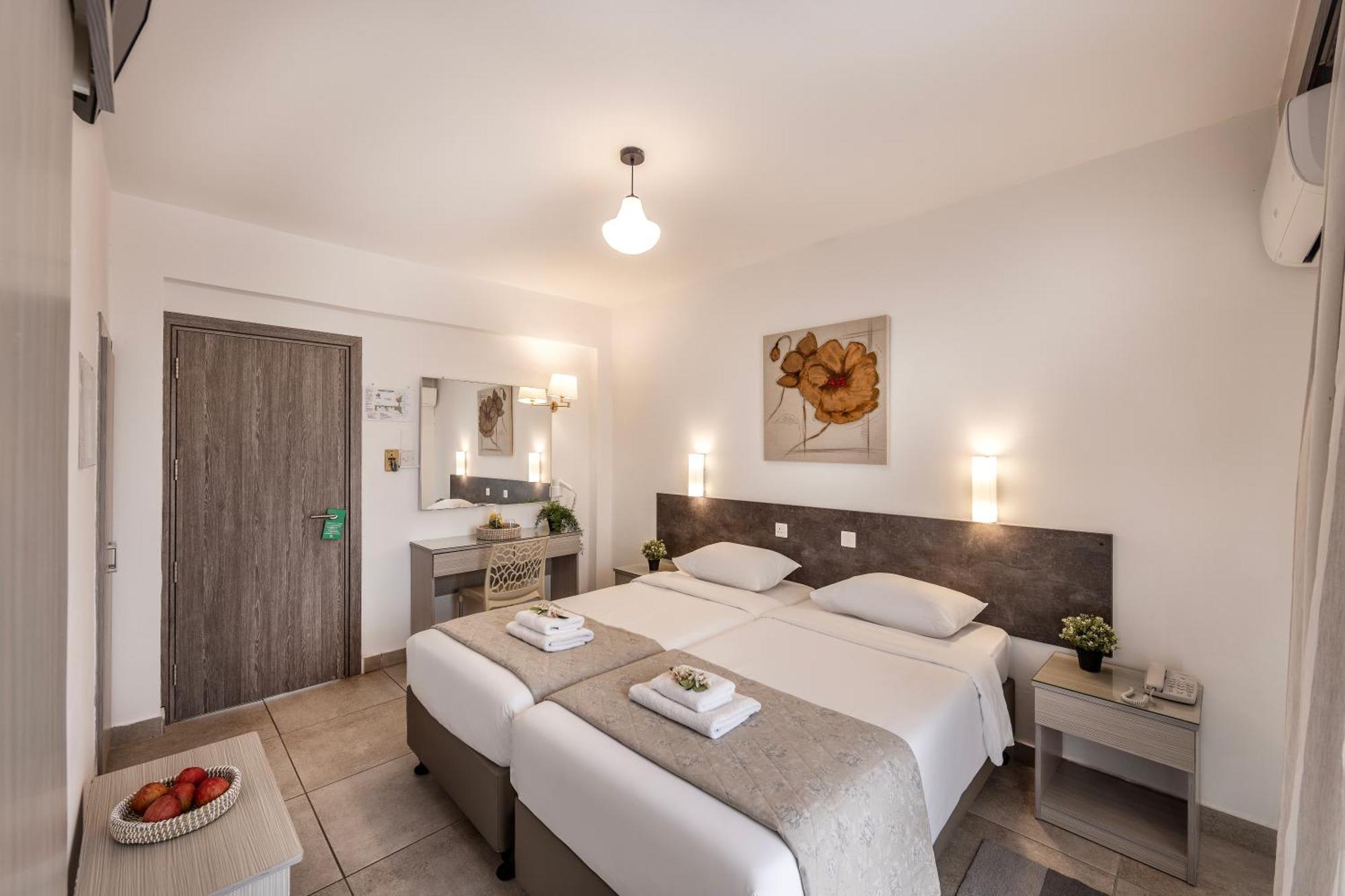Triple Room (2 Adults + 1 Child)